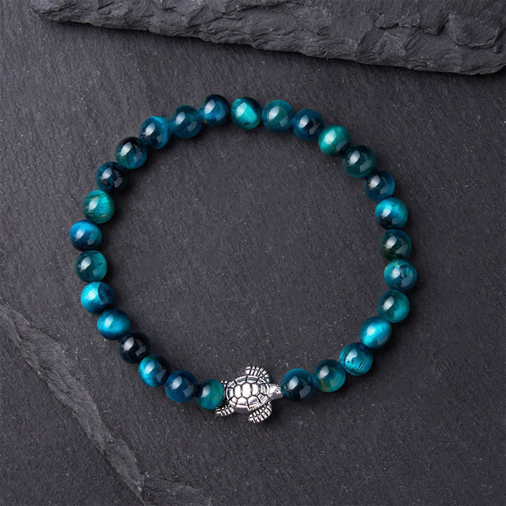 Buddha Stones Kraftvolles Armband aus blauem Tigerauge-Kupfer mit Schildkrötenmotiv - image 2