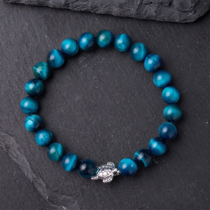 Buddha Stones Kraftvolles Armband aus blauem Tigerauge-Kupfer mit Schildkrötenmotiv - image 11