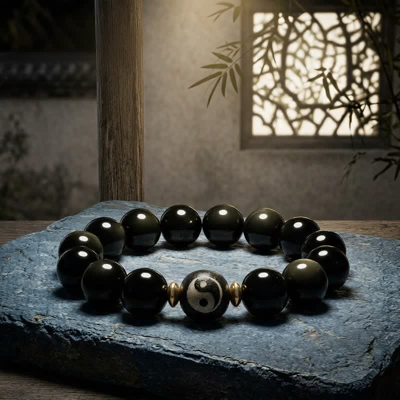 Buddha Stones Armband aus goldenem Obsidian mit Yin-Yang-Symbol für Schutz und Balance - image 1