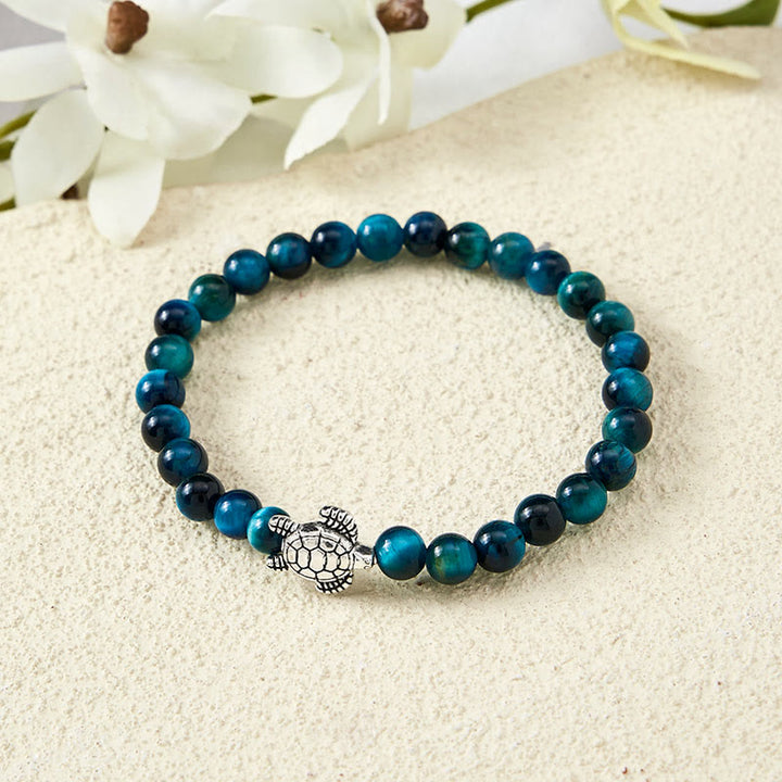 Buddha Stones Kraftvolles Armband aus blauem Tigerauge-Kupfer mit Schildkrötenmotiv - image 3