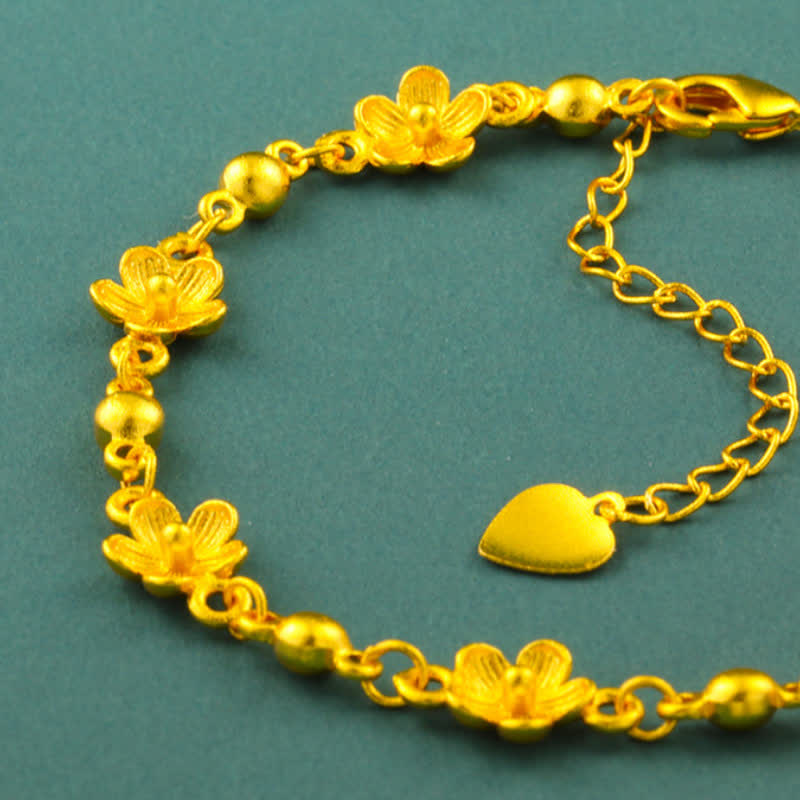 Buddha Stones Armband aus vergoldetem Messing mit Herzanhänger und Pfirsichblütenmotiv - image 3