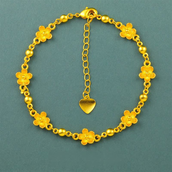 Buddha Stones Armband aus vergoldetem Messing mit Herzanhänger und Pfirsichblütenmotiv - Pfirsichblüte (Handgelenkumfang: 6,3-7,1 Zoll / 16-18 cm) - image 0