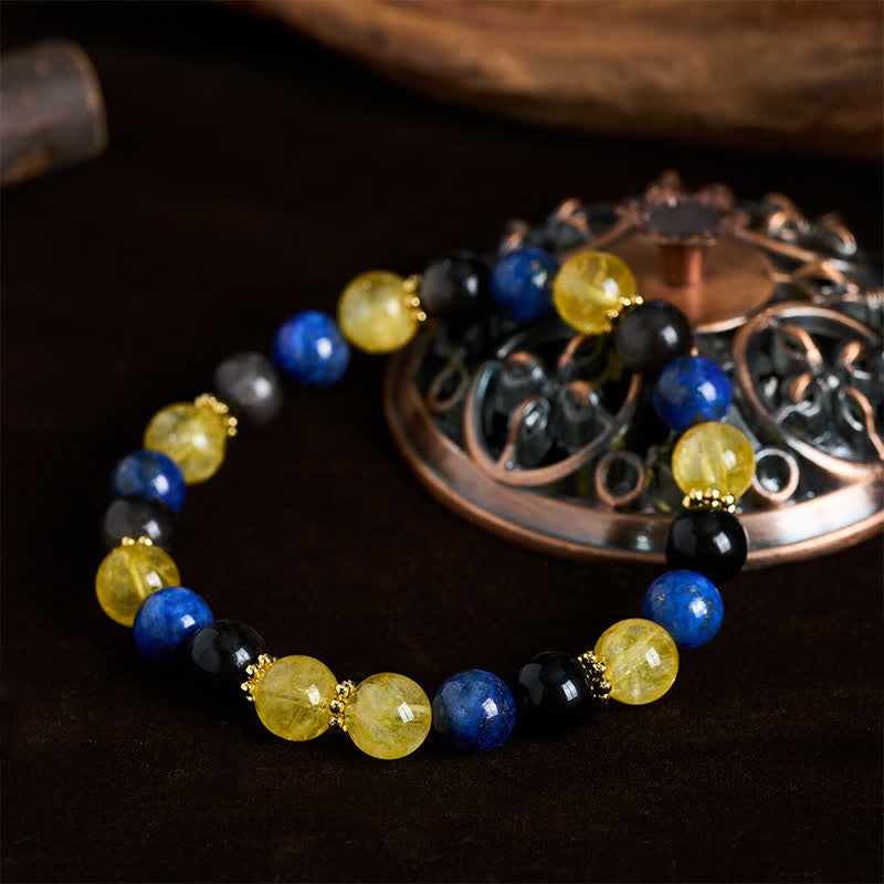 Buddha Stones Armband aus Lapislazuli, silberglänzendem Obsidian und Citrinperlen – Gelassenheit - image 1