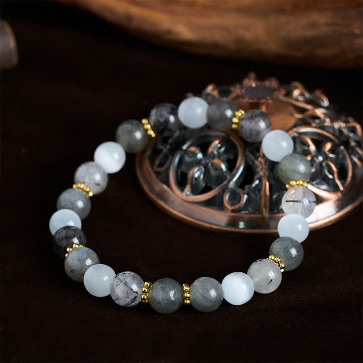 Buddha Stones Armband aus weißem Katzenaugen-Mondstein und schwarzen Rutilquarzperlen - image 1