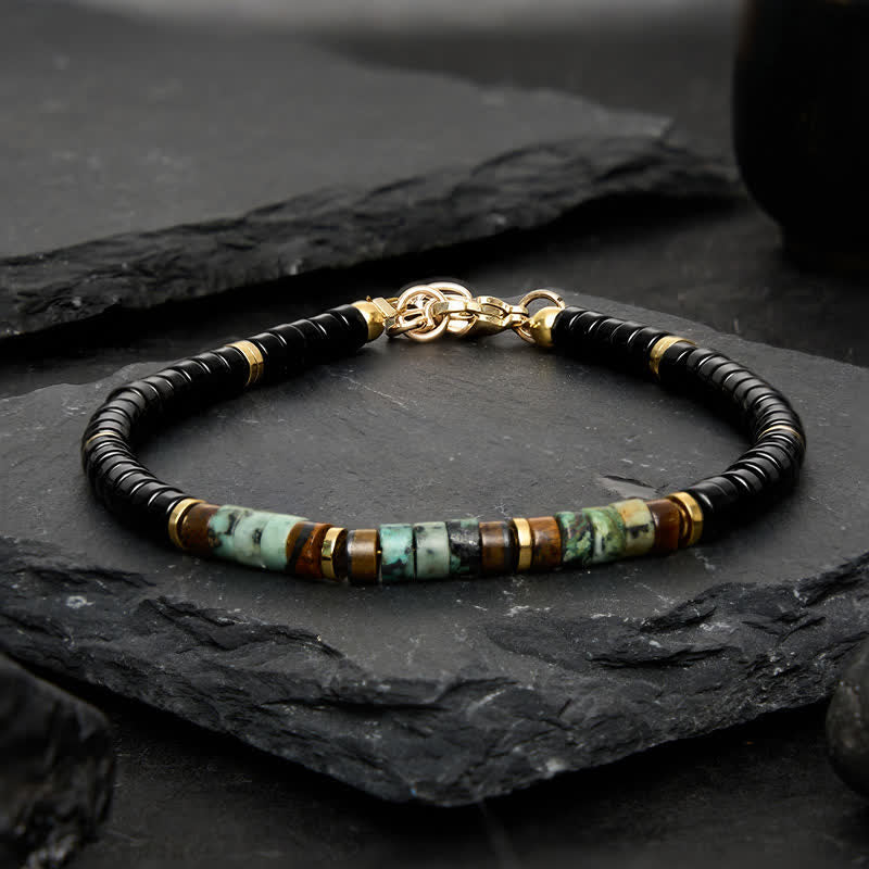 Buddha Stones Schwarzes Onyx- und Türkis-Schutzperlenarmband - image 1