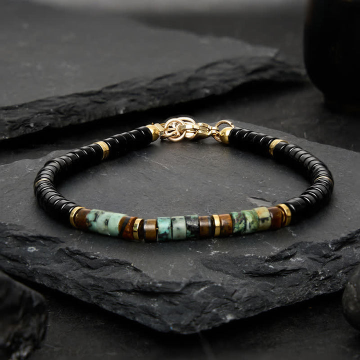 Buddha Stones Schwarzes Onyx- und Türkis-Schutzperlenarmband - image 1
