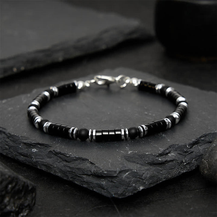 Buddha Stones Schwarzes Onyx-Zylinderarmband mit mattiertem Zwischenperlen - image 1