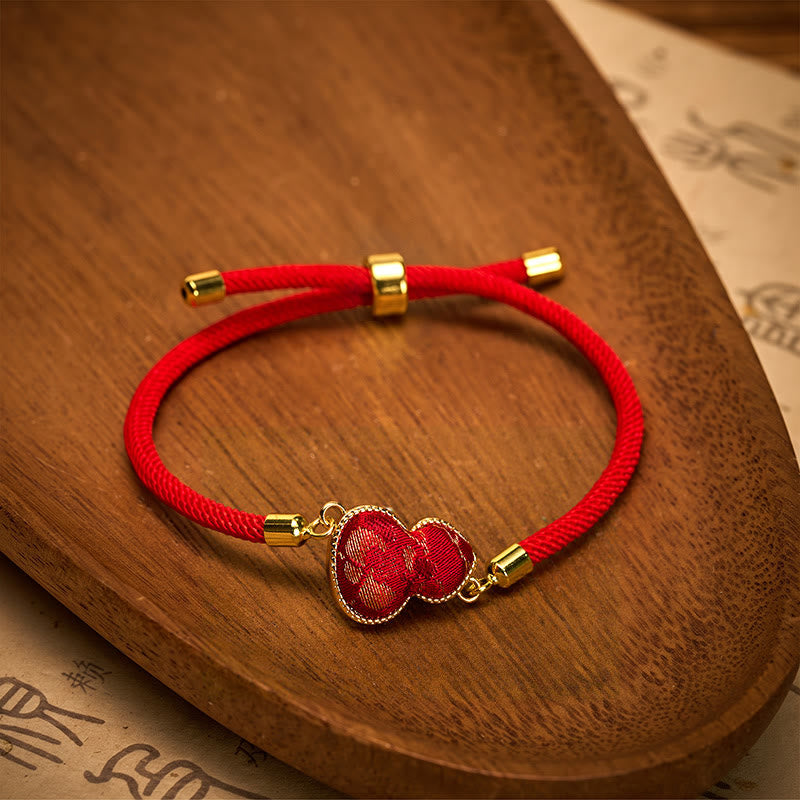 Buddha Stones Rotes Armband aus Brokatkürbis mit Schnurliedmotiv zum Schutz - image 1