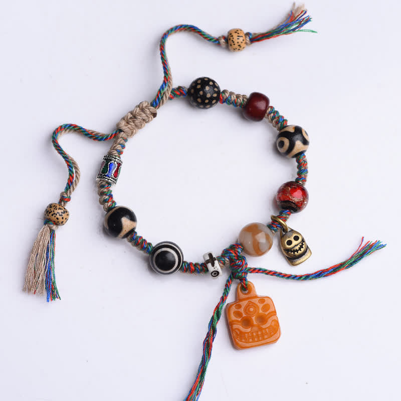 Buddha Stones Tibetisches Dzi-Perlen-Armband mit geflochtenem Knochenband in verschiedenen Farben – ein Segensgeschenk - image 1