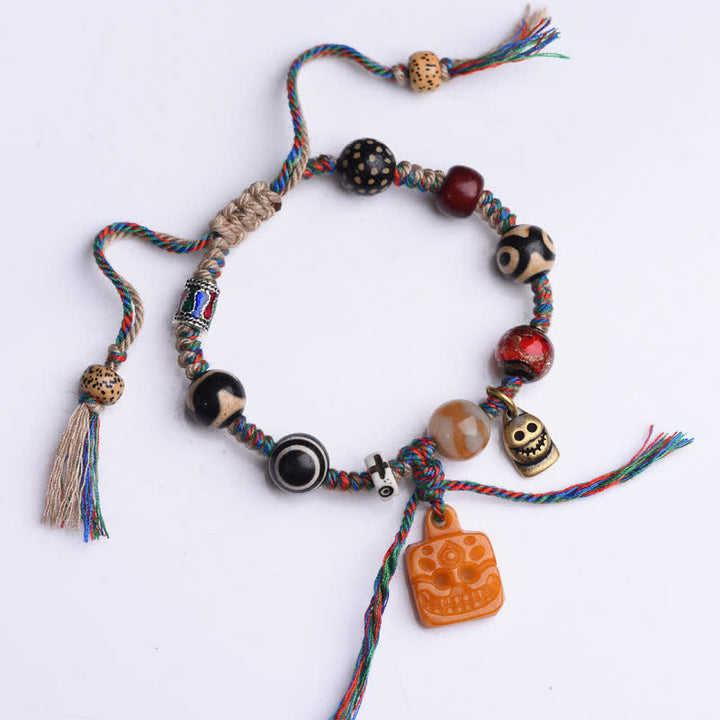 Buddha Stones Tibetisches Dzi-Perlen-Armband mit geflochtenem Knochenband in verschiedenen Farben – ein Segensgeschenk - image 1