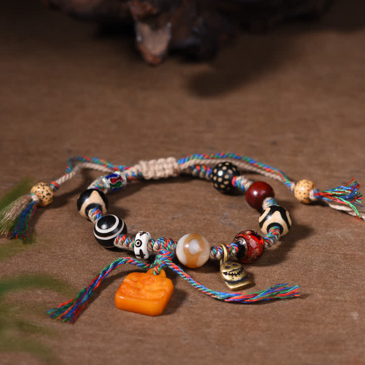 Buddha Stones Tibetisches Dzi-Perlen-Armband mit geflochtenem Knochenband in verschiedenen Farben – ein Segensgeschenk - image 4