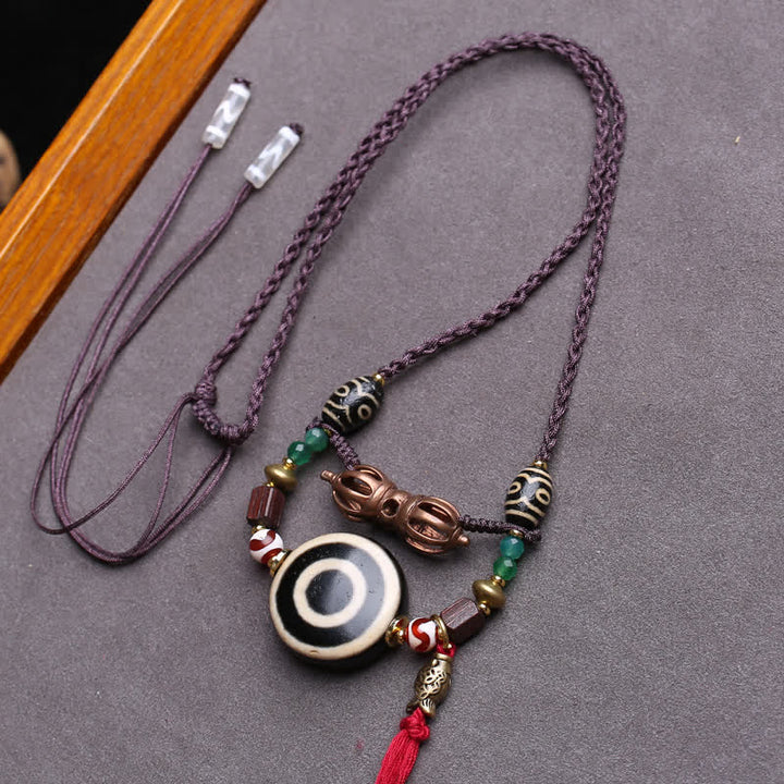 Buddha Stones Tibetische Dzi-Perlen-Vajra-Dreiaugen-Dzi-Perlen-Geflochtene-Seil-Schutzkette - Ca. 24 × 10 mm - image 0