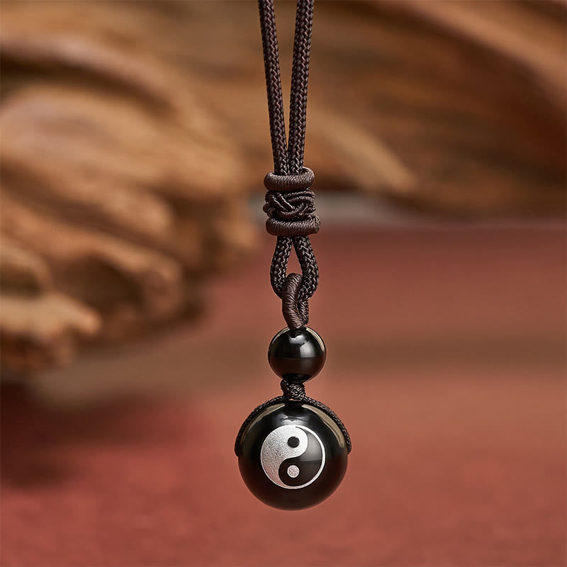 Buddha Stones Halskettenanhänger aus schwarzem Obsidian mit Yin-Yang-Symbol zur Reinigung - Yin Yang Silberfolienmuster - 26,8 Zoll / 68 cm - image 0