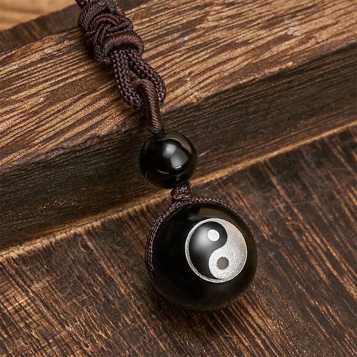 Buddha Stones Halskettenanhänger aus schwarzem Obsidian mit Yin-Yang-Symbol zur Reinigung - image 1