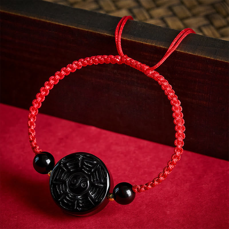 Buddha Stones Armband aus rotem Faden und schwarzem Obsidian mit rundem Bagua-Motiv - image 1