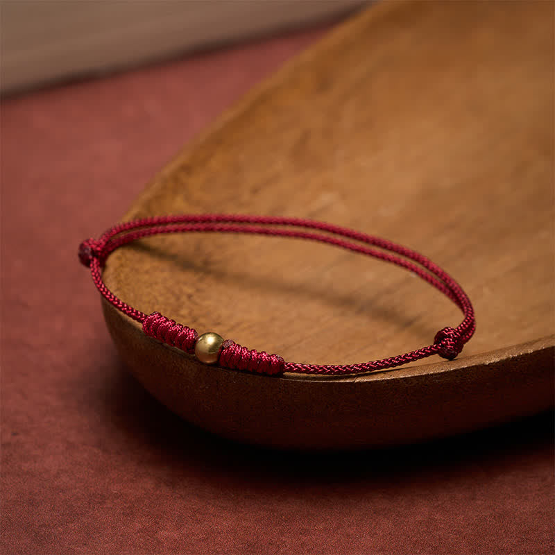 Buddha Stones Armband mit Verbindungen aus rotem Faden und Kupferperlen - image 1