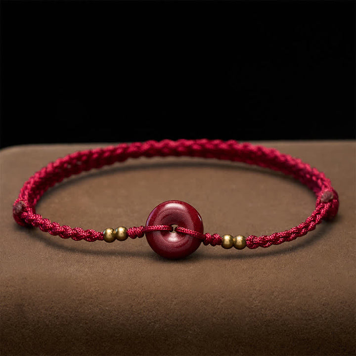 Buddha Stones Rotes Armband mit Friedensschnalle aus Kupfer zum Schutz - image 1