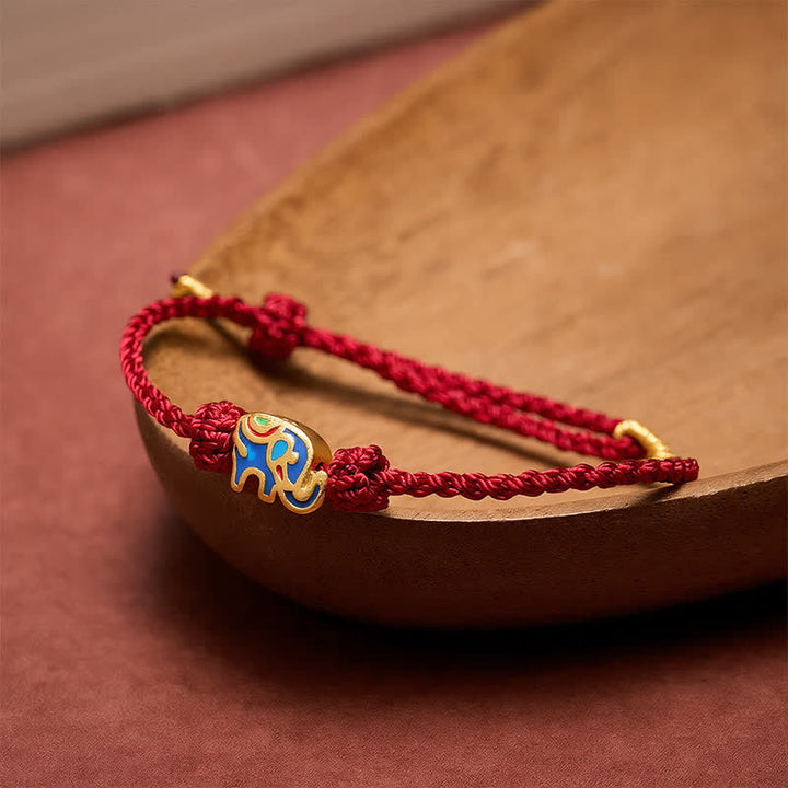 Buddha Stones Elefanten-Armband aus rotem, gewebtem Band – Weisheitssymbol - image 1
