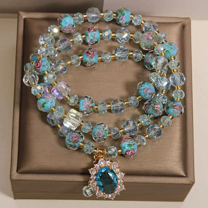 Buddha Stones Blaues Liuli-Glasperlen-Armband mit ovalem Blumenanhänger und dreifacher Wicklung - image 1