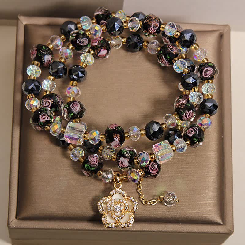 Buddha Stones Schwarzes Liu Li Glasperlen-Armband mit Kamelienblume und harmonischem Verbindungsmotiv - image 1