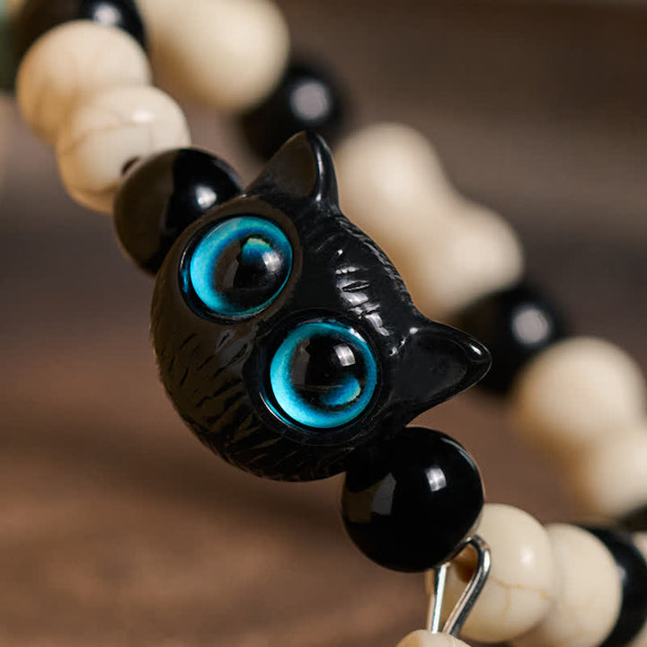 Buddha Stones Schwarzes Katzen-Perlenarmband mit Totenkopfmotiv - image 3