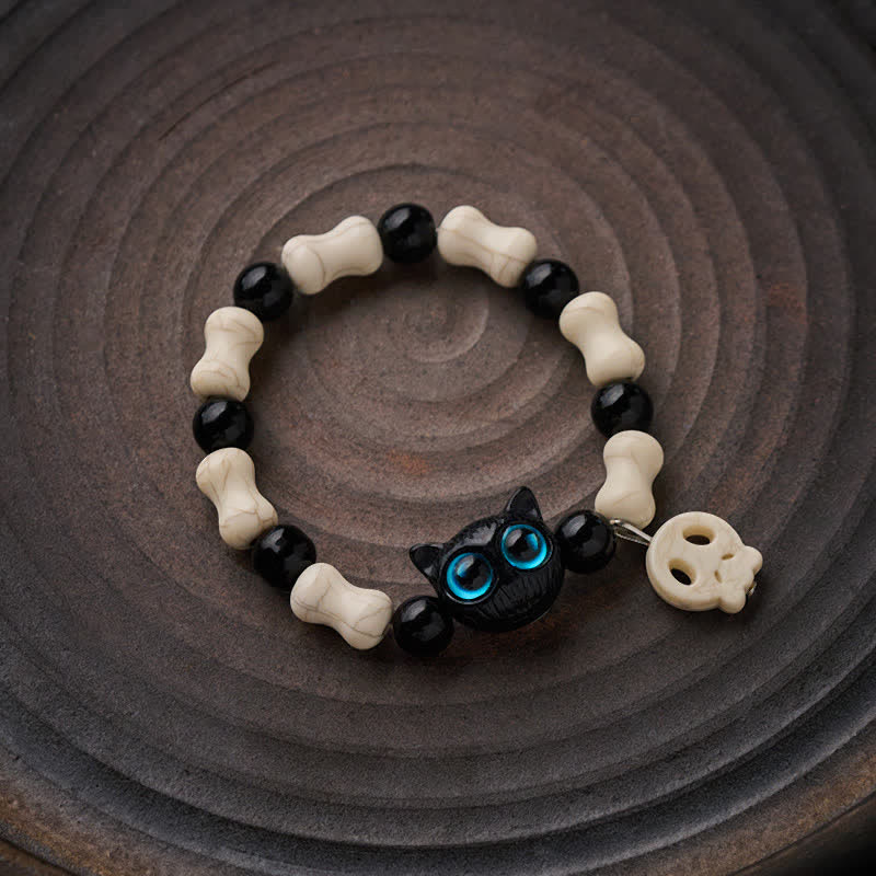 Buddha Stones Schwarzes Katzen-Perlenarmband mit Totenkopfmotiv - image 1