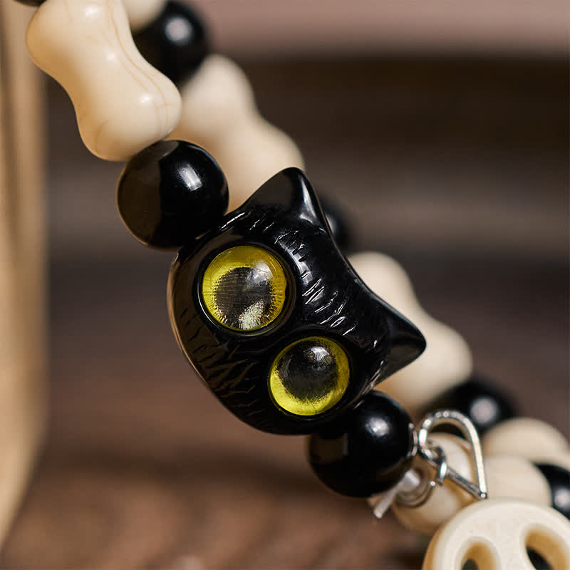 Buddha Stones Schwarzes Katzen-Perlenarmband mit Totenkopfmotiv - image 12