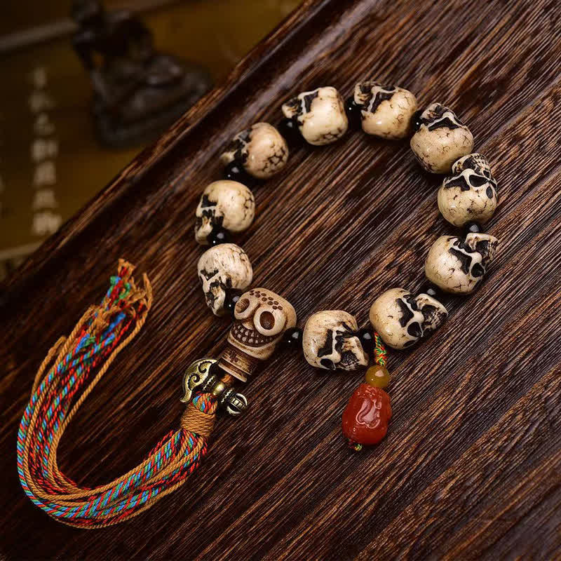 Buddha Stones Tibetisches handgeschnitztes Knochenperlenarmband mit dem Muster „Herr des Leichenwaldes“ zum Schutz vor dem Tod - 22 × 14 × 13 mm - image 0