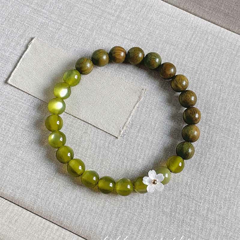 Buddha Stones Armband mit grünem Sandelholz-Katzenaugenblumen-Anhänger - 8 mm Katzenaugenstein - image 13