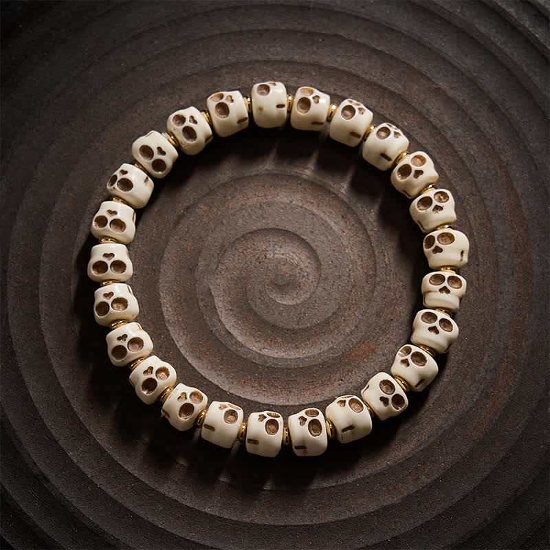 Buddha Stones Armband aus tibetischen Knochenperlen mit Totenkopfmotiv des Herrn des Leichenwaldes für Schutz und Mut - image 1