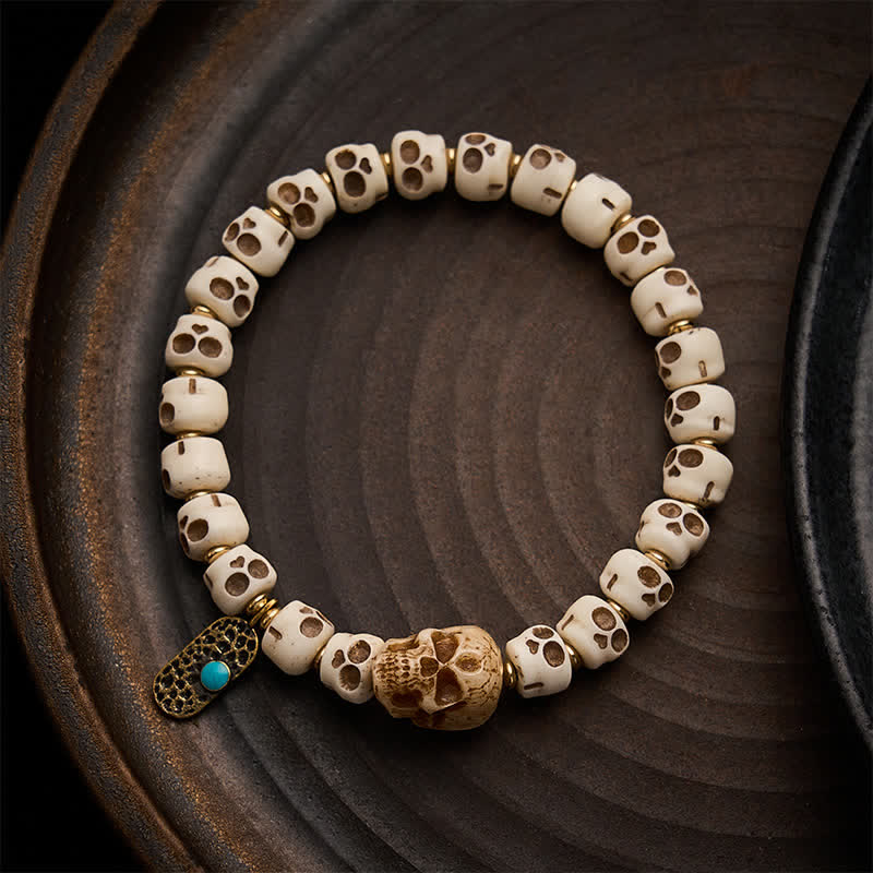 Buddha Stones Handgeschnitztes Armband aus Knochenperlen mit Totenkopfmotiv des Herrn des Leichenwaldes – Symbol für Stärke und Wandel - 9 × 6,3 mm - image 0