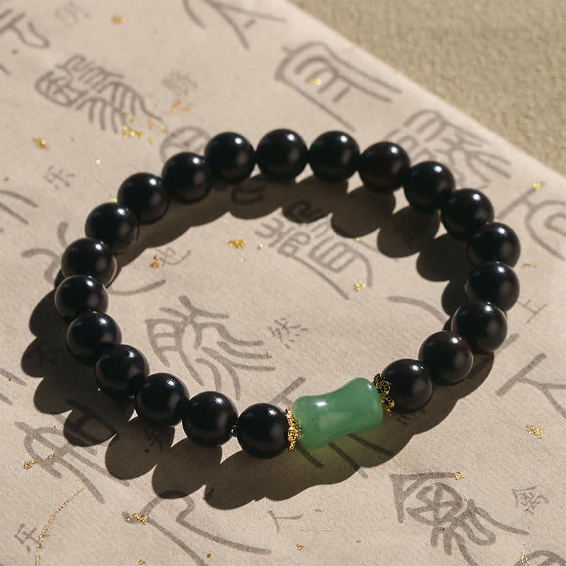 Buddha Stones Unisex-Armband aus Ebenholz, grünem Sandelholz mit natürlicher Maserung - image 1