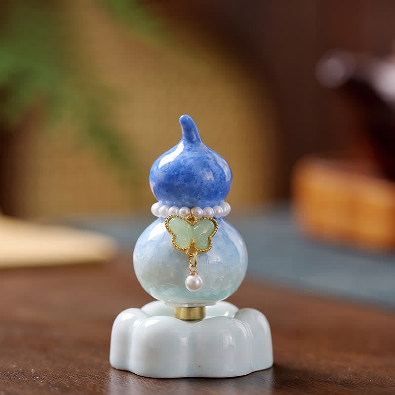 Buddha Stones Drehbarer Schmetterlingskürbis aus Keramik – Dekoration für ein achtsames Leben - Kürbis Dunkelblau + Hellgrün Schmetterling + Blauer Sockel - image 0