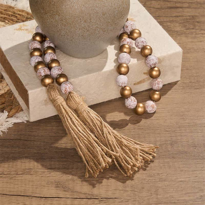 Buddha Stones Runde Holzperlengirlande in Antikweiß und Gold, für ein bewusstes Wohnen - image 3