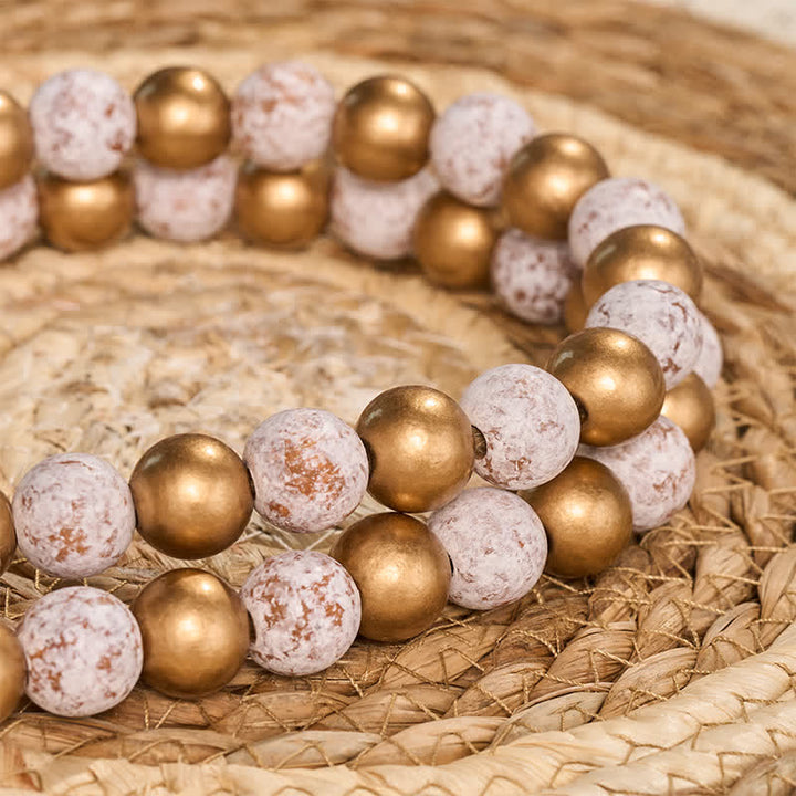 Buddha Stones Runde Holzperlengirlande in Antikweiß und Gold, für ein bewusstes Wohnen - image 7