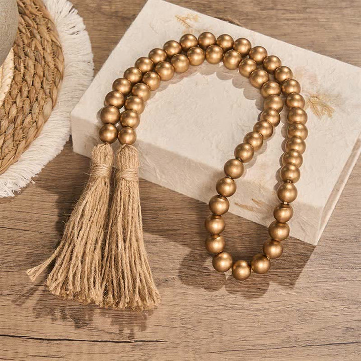 Buddha Stones Rustikale goldene Holzperlengirlande mit Quasten, Mindful Living Decor - image 2