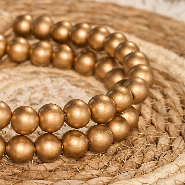 Buddha Stones Rustikale goldene Holzperlengirlande mit Quasten, Mindful Living Decor - image 7