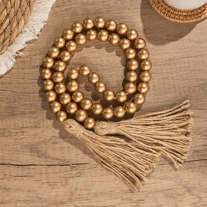 Buddha Stones Rustikale goldene Holzperlengirlande mit Quasten, Mindful Living Decor - Holz - image 0