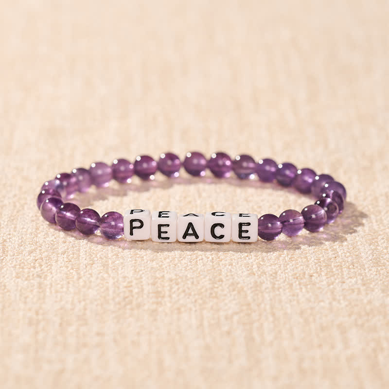 Buddha Stones Amethyst-Meditationsarmband mit PEACE-Buchstabenperlen - image 1