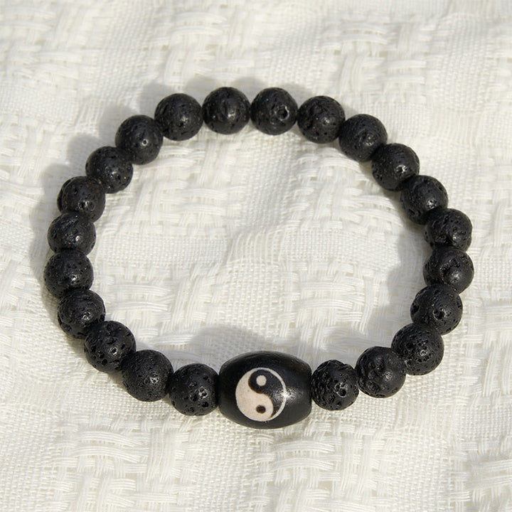 Buddha Stones Lavastein-Armband mit schwarzen Onyx-Yin-Yang-Perlen - image 1
