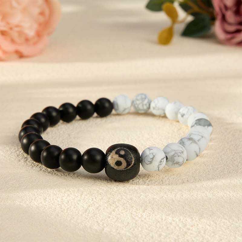 Buddha Stones Armband aus runden Perlen mit schwarzem Onyx, weißem Türkis und Yin-Yang-Symbol - Schwarzer Onyx und weißer Türkis - 5,9–6,3 Zoll (15–16 cm) - image 0