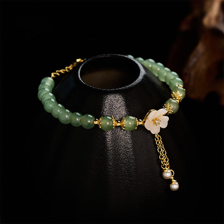 Buddha Stones Armband aus Kupfer mit Hetian-Jade-inspiriertem Glücksblumen-Perlenanhänger - image 3