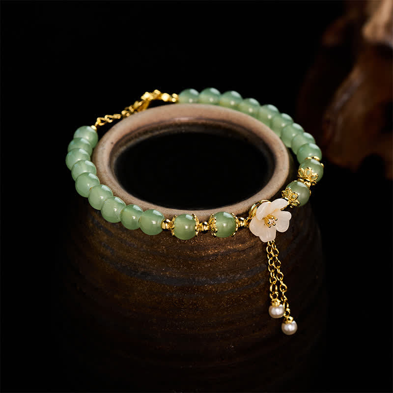 Buddha Stones Armband aus Kupfer mit Hetian-Jade-inspiriertem Glücksblumen-Perlenanhänger - Jade (Fülle ♥ Glück) - image 0