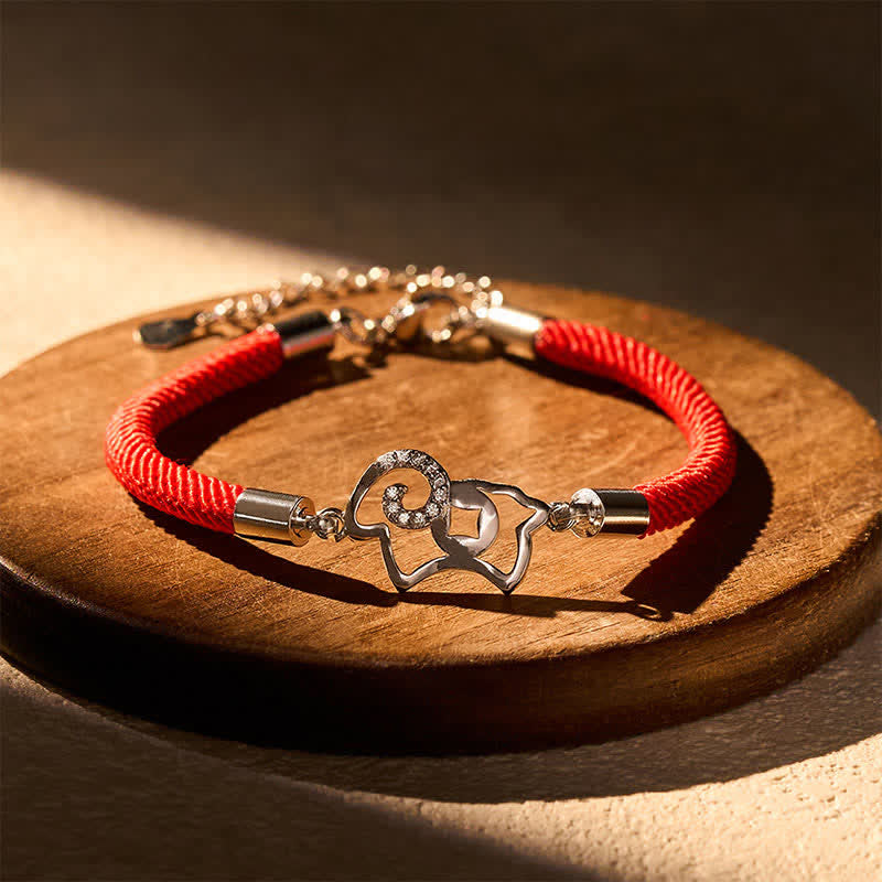 Buddha Stones Geflochtenes rotes Armband mit Ziegen-Sternzeichen-Anhänger und Stärke - image 1