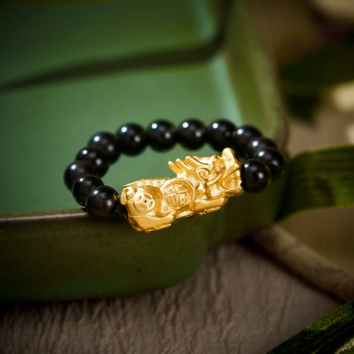 Buddha Stones Schwarzer Obsidian-Kupfer-Pi-Xiu-Mini-Stretch-Perlenring für Stärke und Energie - Größe L: Passend für US Größe 8–10 - image 0