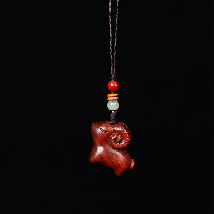 Buddha Stones Schlüsselanhänger aus rotem und grünem Sandelholz mit Ziegenmotiv, handgeschnitzt, Glücksbringer - Einfaches Seil - Rotes Sandelholz - image 2