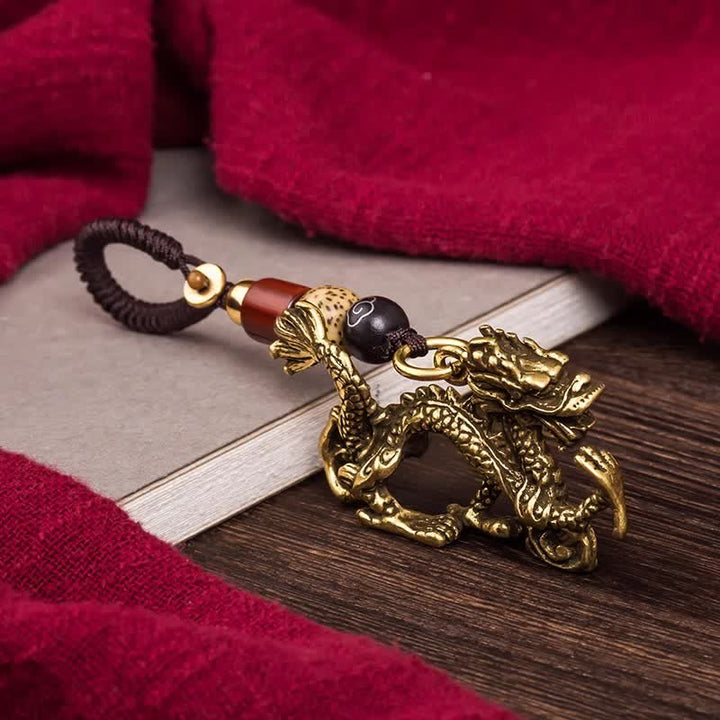 Buddha Stones Schlüsselanhänger aus Messing mit geflochtenem Anhänger in Form des chinesischen Tierkreiszeichens - Drachen - image 17