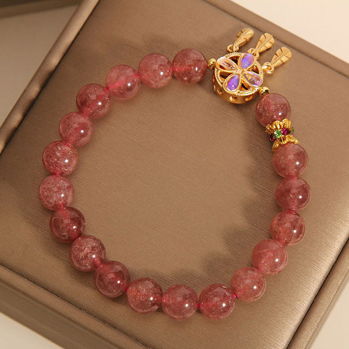 Buddha Stones Armband mit natürlichem Erdbeerquarz, vierblättriges Kleeblatt, Traumfänger, Charm-Liebesarmband