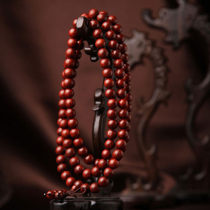 Buddha Stones Tibetisches kleines Blatt rotes Sandelholz 108 Perlen Mala Meditationsarmband