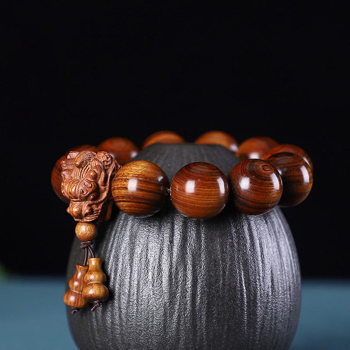 Buddha Stones, Rosenholz, grünes Sandelholz, kleines Blatt, rotes Sandelholz, Adlerholz, Drache geschnitztes Schutzarmband